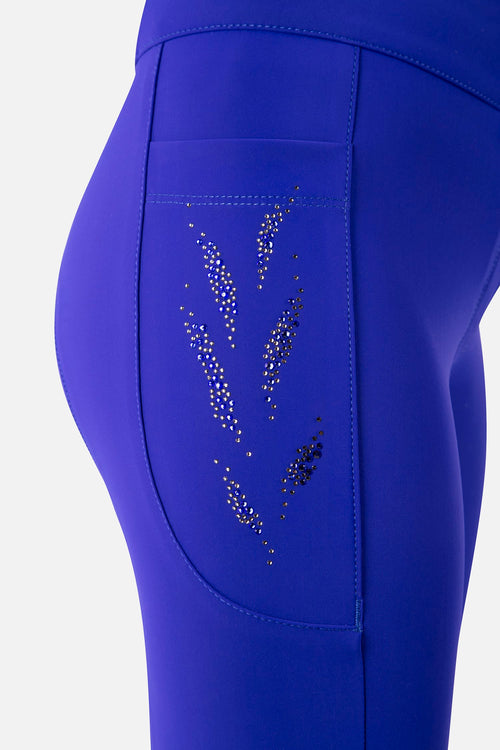 Nitin-Hosen, Grip-Knie, Viola-Bonbons – Animo